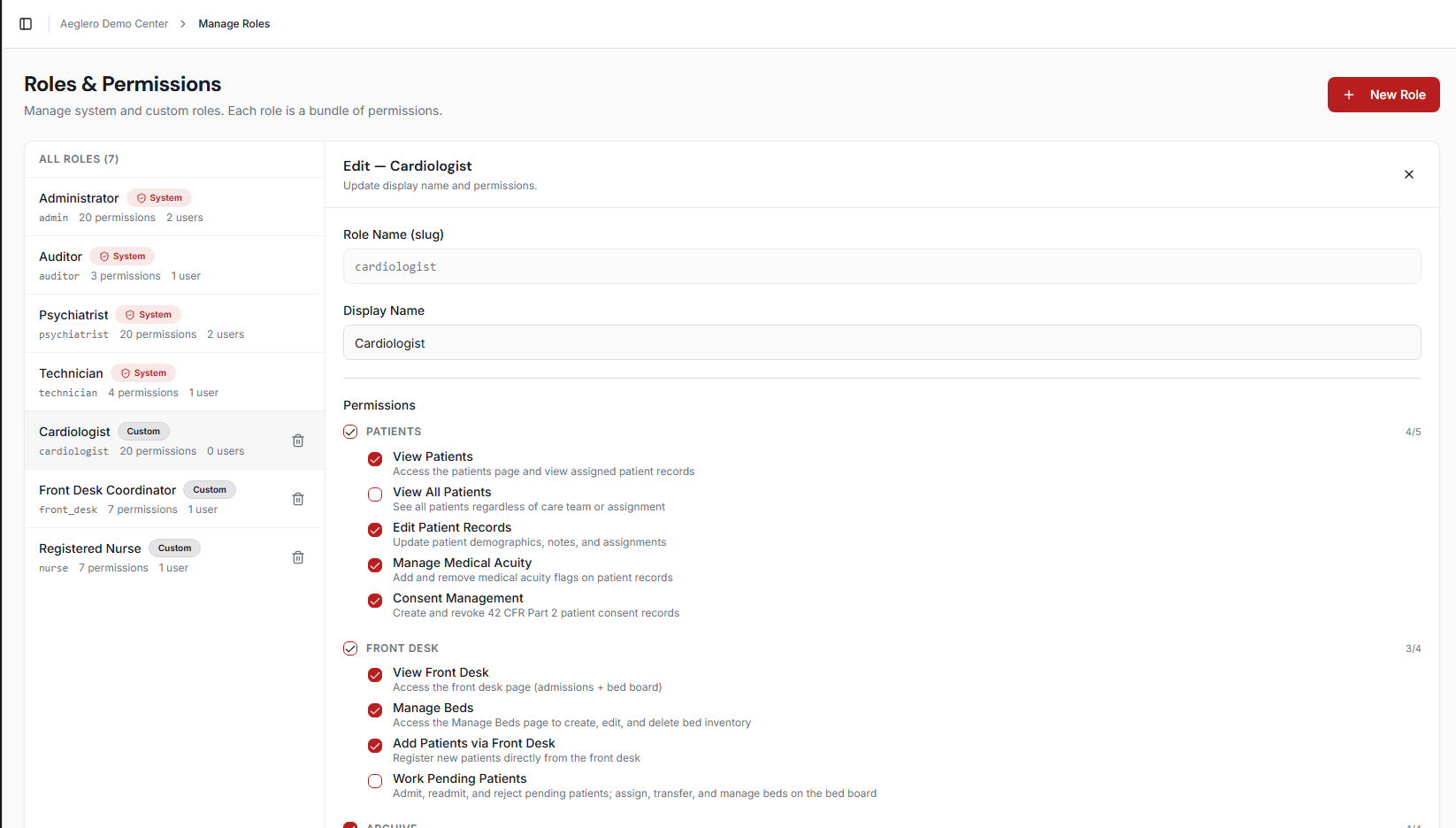 Manage Roles page with the role list on the left and an open role editor on the right showing permission groups